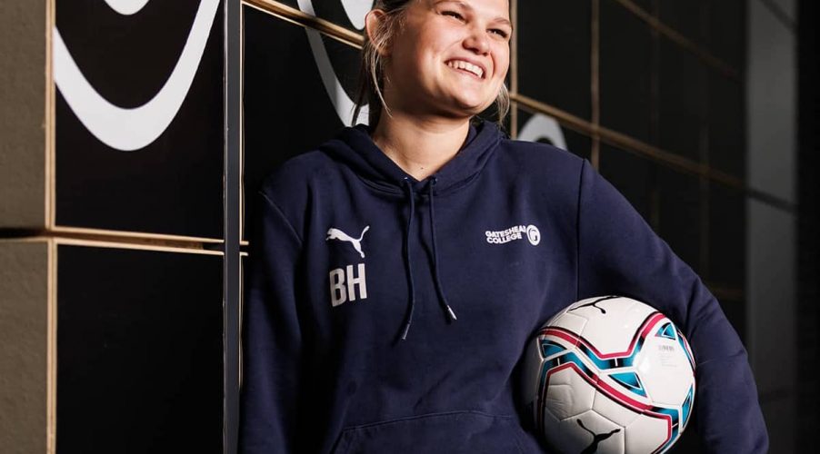 Women's football player smiling