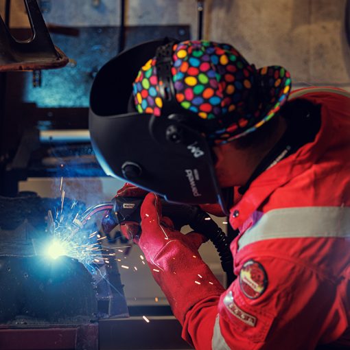 HND student welding, whilst wearing protective gear.