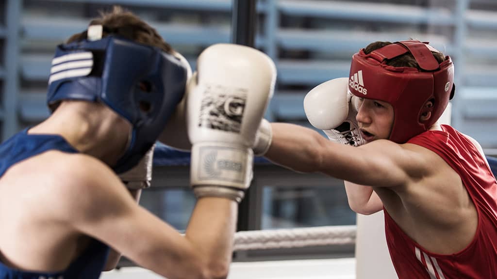 Boxing students pracitce match